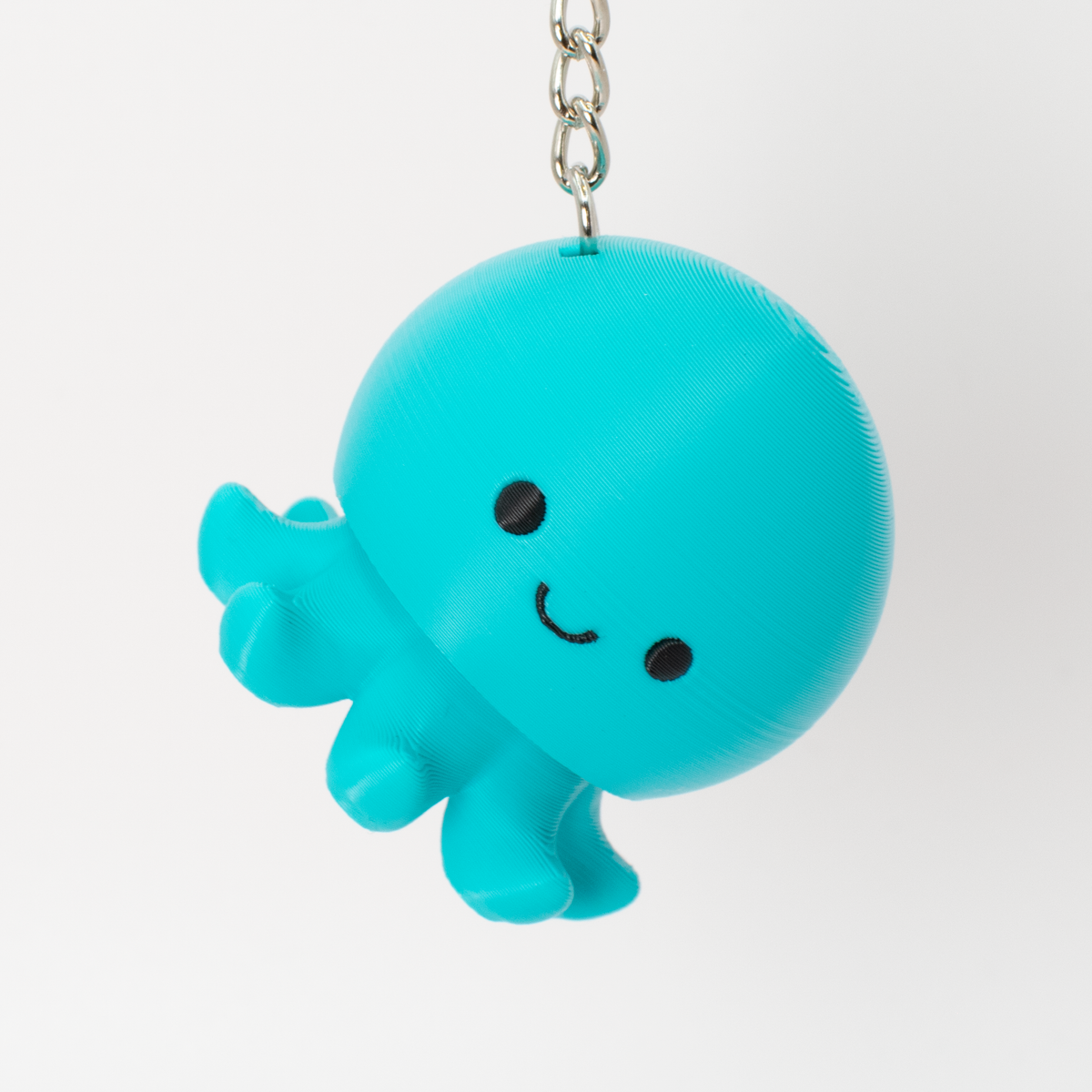 Party Octopus Fidget Clicker, teal, as a bag charm