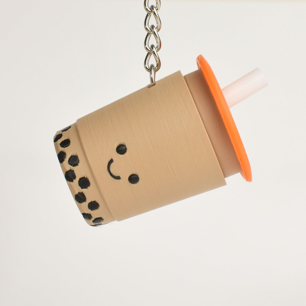 Bubble Tea Fidget Clicker, as a bag charm