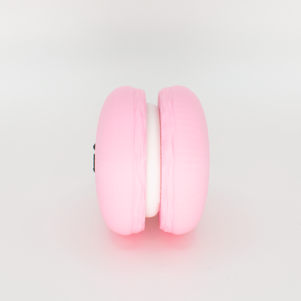 Smiley Macaron Fidget Clicker, side view