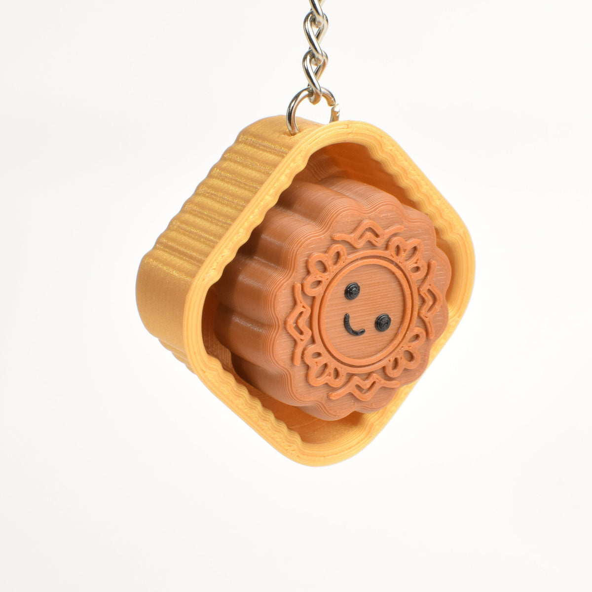 Mooncake Fidget Clicker, single keychain, side view