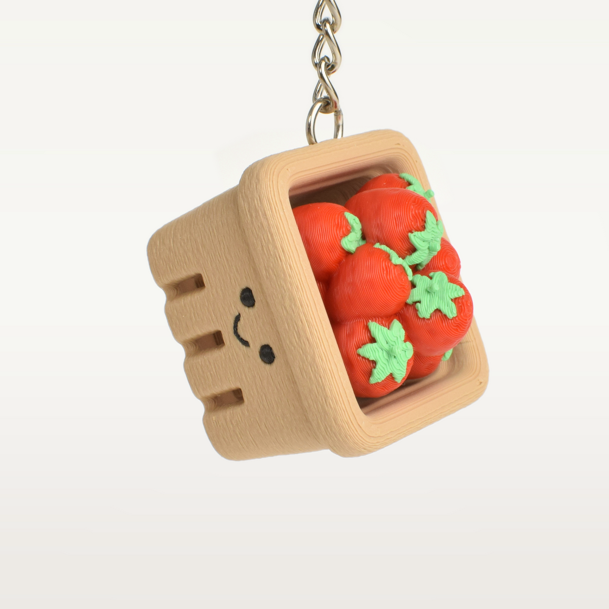 Strawberry Basket Fidget Clicker, as a bag charm
