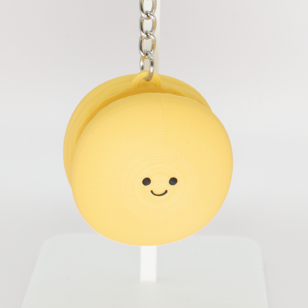 Smiley Macaron Fidget Clicker, lemon