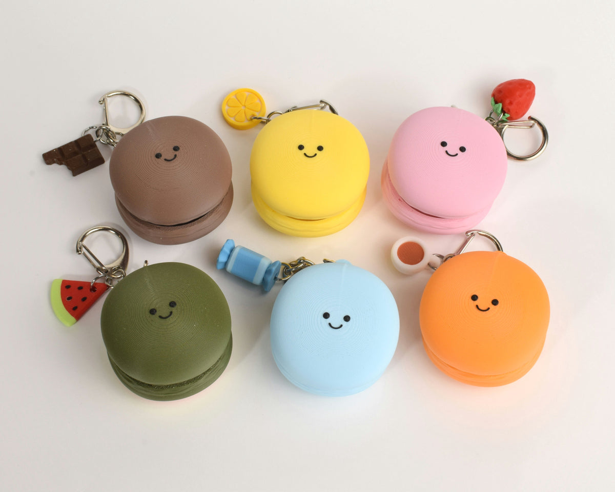 Mystery Macaron Fidget Clicker, all six designs