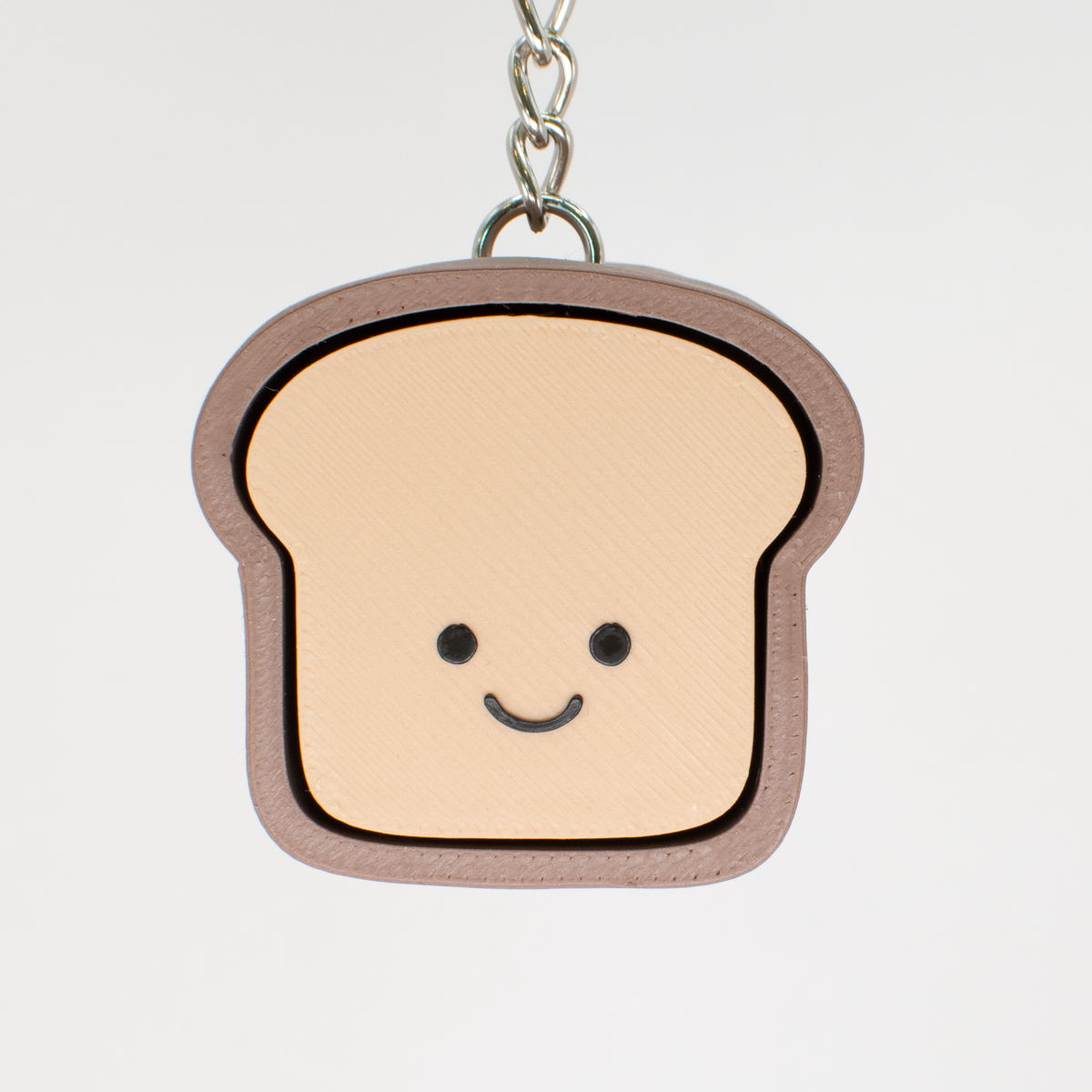 Brown Bread Loaf Fidget Clicker, on a keychain