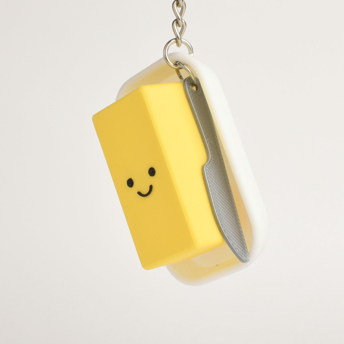 Butter Fidget Clicker, on a keychain