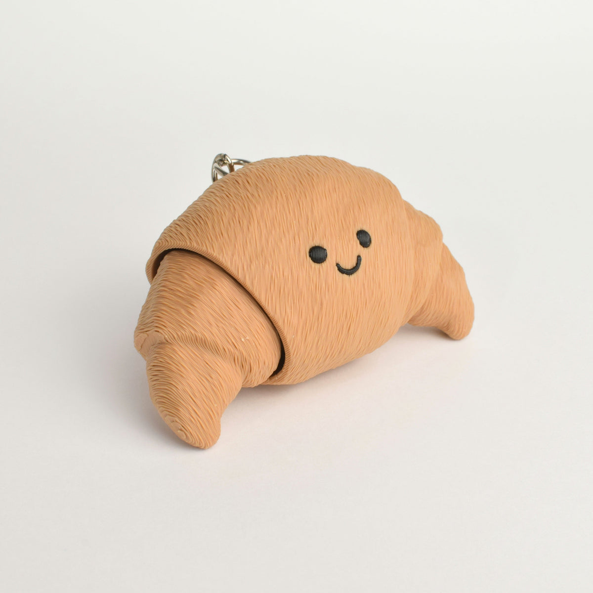Croissant Fidget Clicker, side view