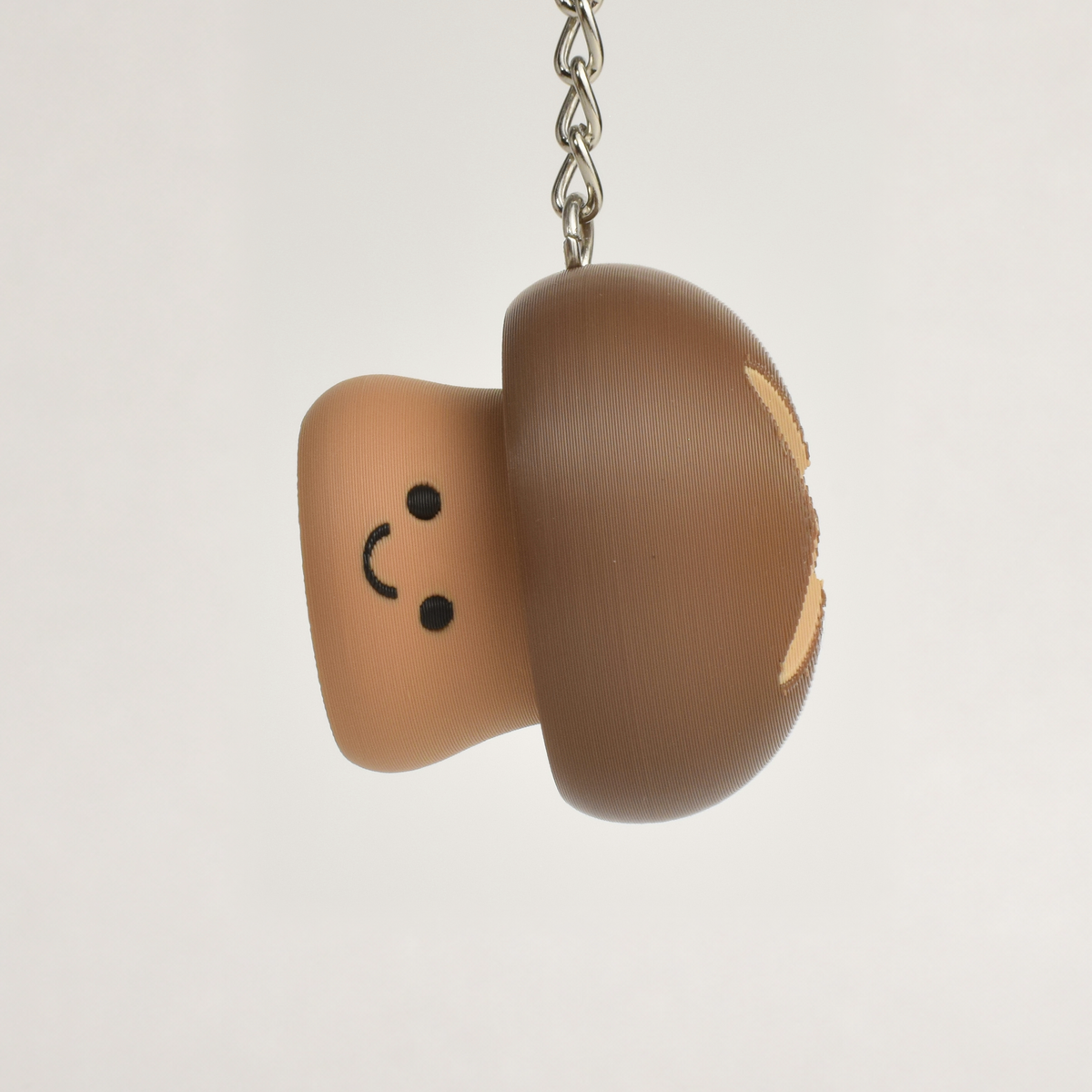 Shiitake Mushroom Fidget Clicker, on a keychain