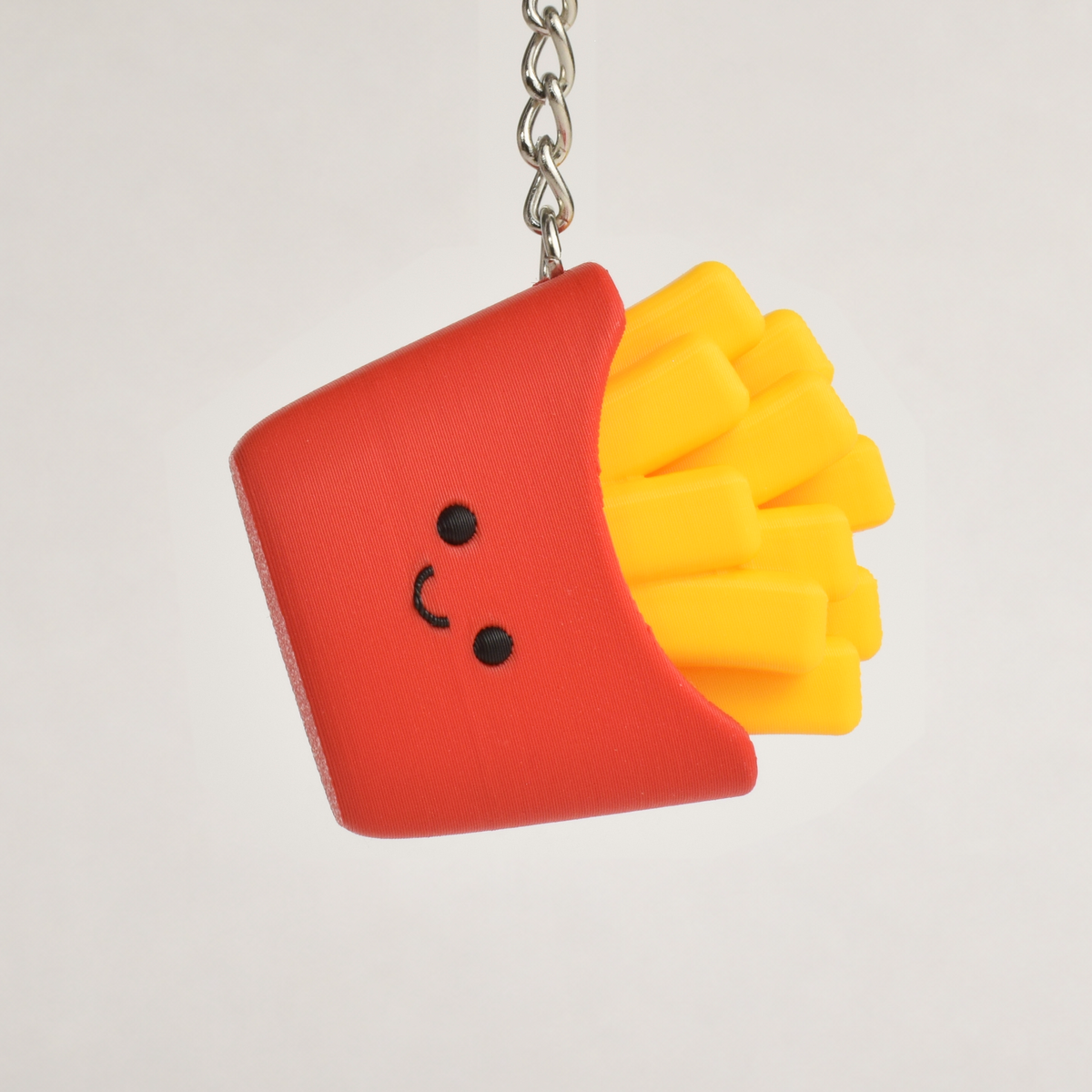 Fries Fidget Clicker, on a keychain