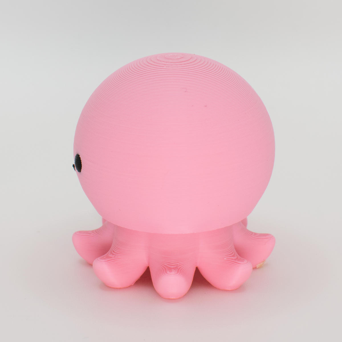 Party Octopus Fidget Clicker, teal, side view