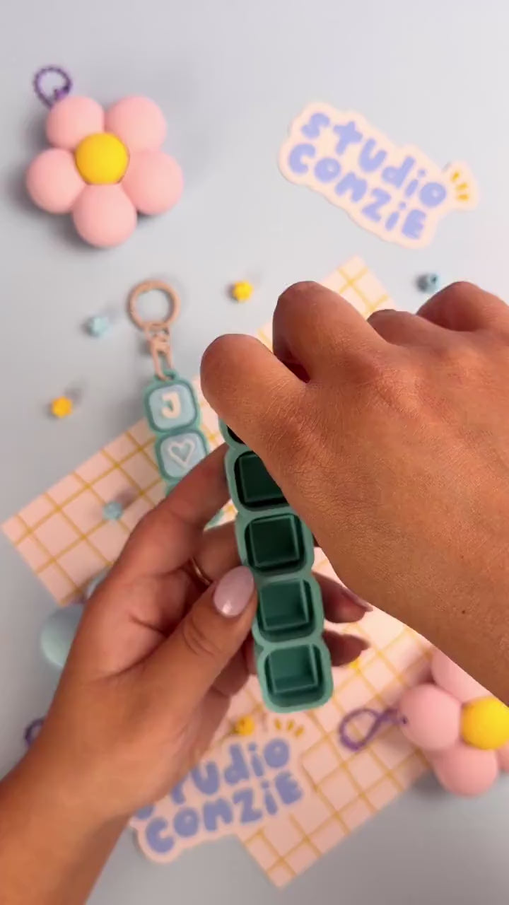 Custom Name Bubble Clicker Keychain (Rainbow Sherbet - Pink, Teal, Lime, Light Blue)