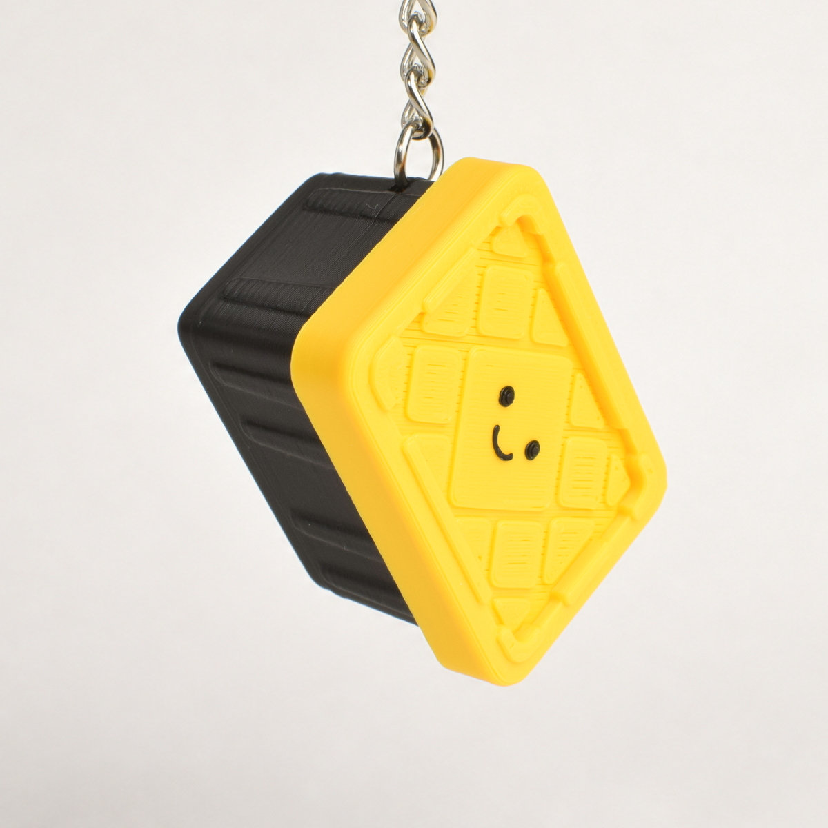 Storage Bin Fidget Clicker, on a keychain
