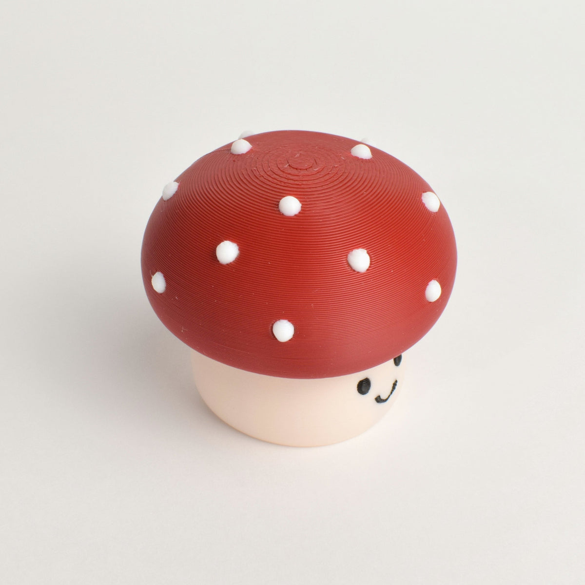 Red Mushroom Fidget Clicker, top view