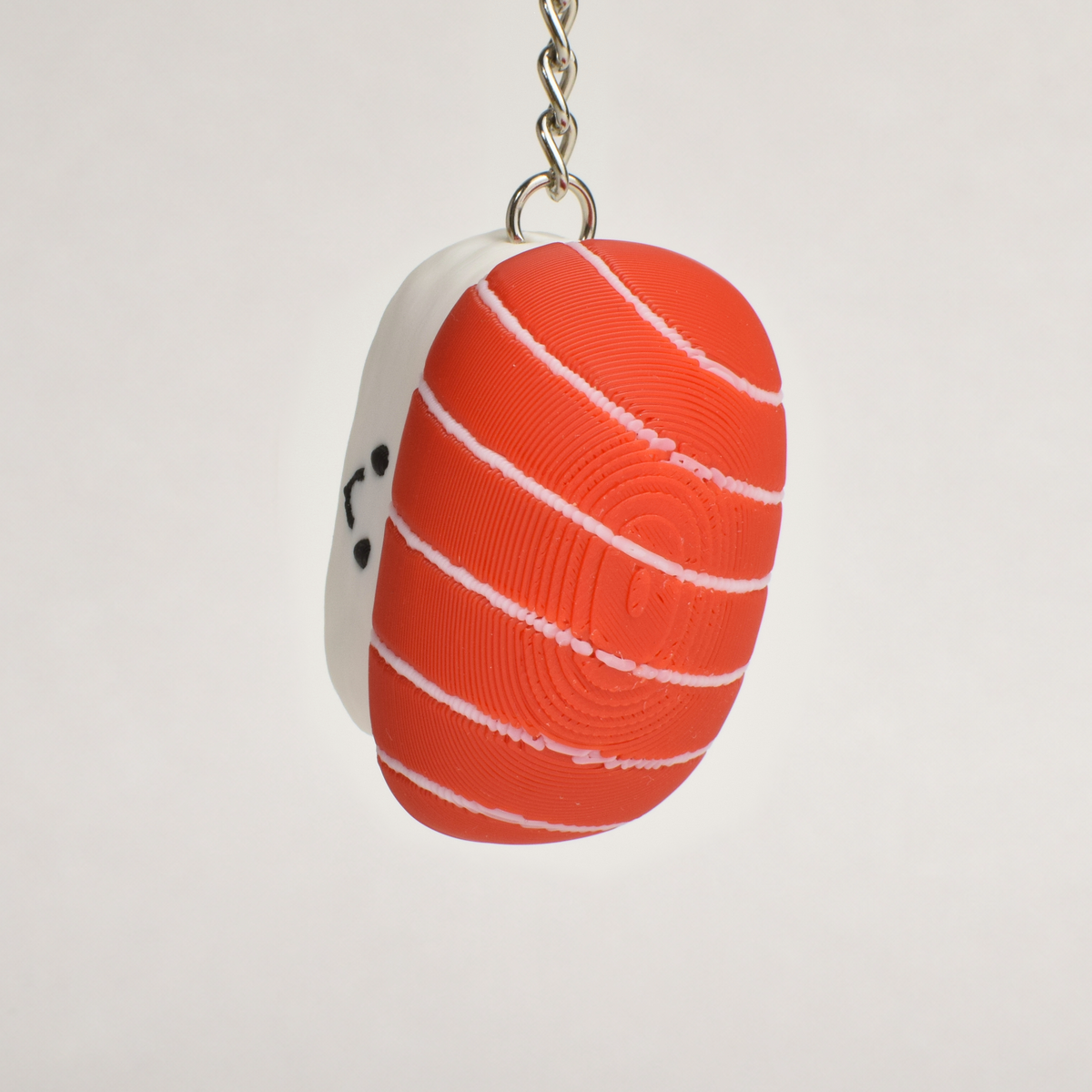 Tuna Sushi Fidget Clicker, on a keychain